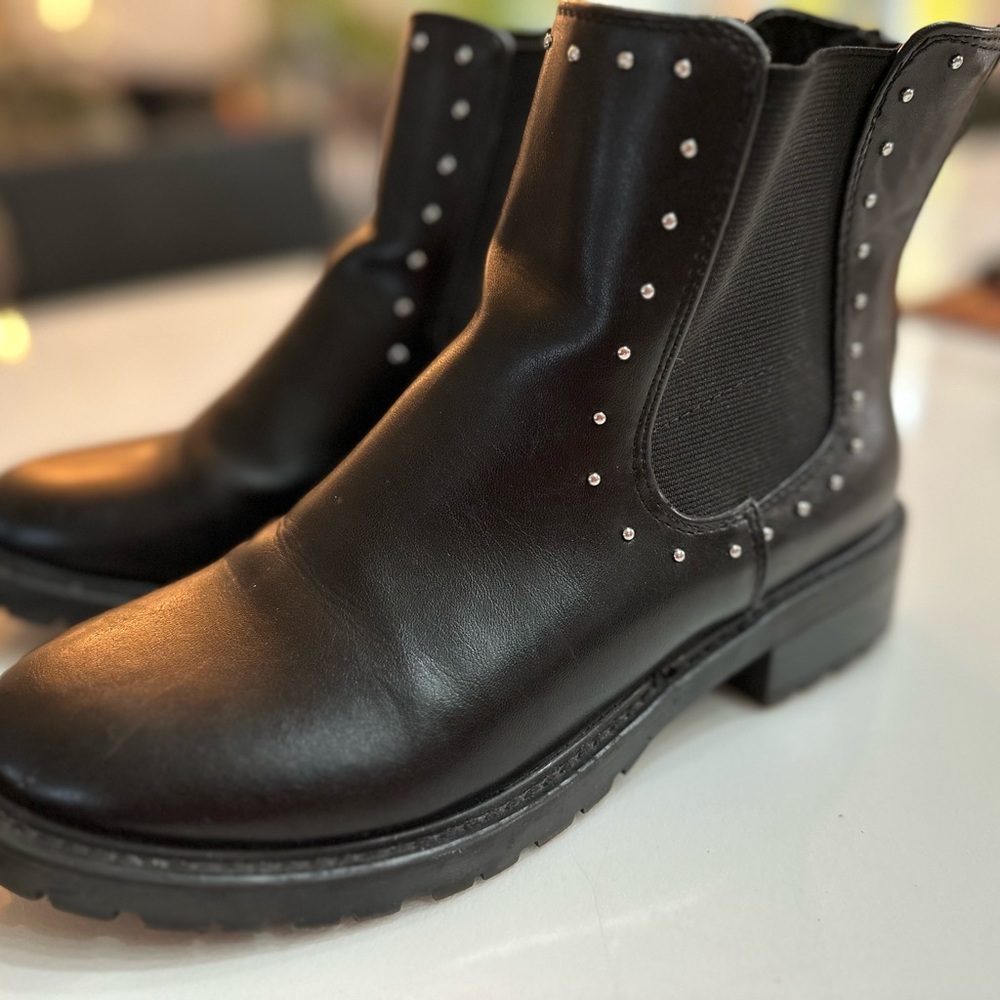 Black with silver studs.